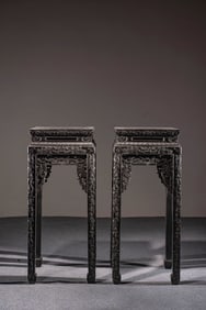 A Pair of Chinese Carved Hardwood Stands