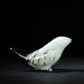 A Chinese Carved Jade Bird Statuette