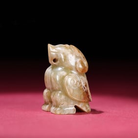 A Chinese Carved Jade Bird Statuette
