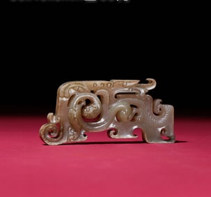A Chinese Carved Jade Dragon Pendant