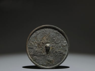 A Chinese Bronze Mirror