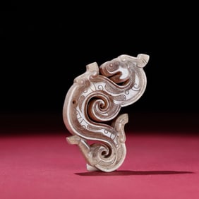 A Chinese Carved Jade Dragon Pendant