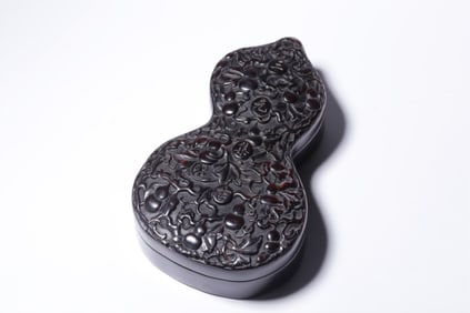 A Chinese Carved Hardwood Double Gourd Box with Lid