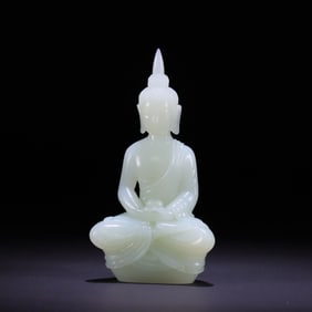 A Chinese Carved Jade Figure of Buddha