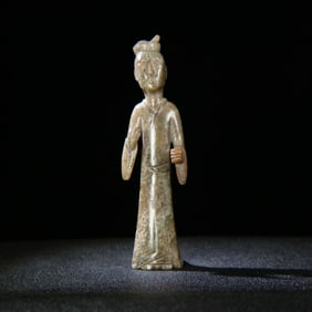 A Chinese Carved Jade Figure of Man