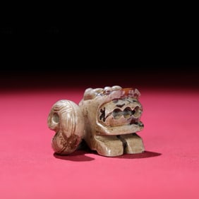 A Chinese Carved Jade Dragon Statuette