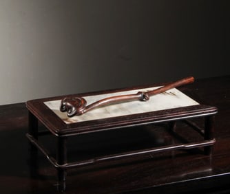 A Chinese Carved Bamboo Ruyi Decoration