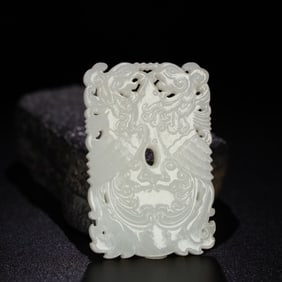 A Chinese Carved Jade Double-Phenix Pendant