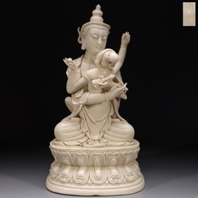 A Chinese White Glazed Porcelain Figure of Buddha