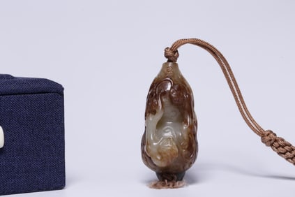 A Chinese Carved Jade Dragon Pendant