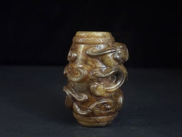 A Chinese Carved Jade Dragon and Phenix Pipe Pendant