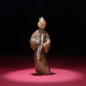 A Chinese Carved Jade Figure of Man