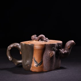 A Chinese Carved Yixing Clay Tea Pot