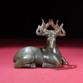 A Chinese Carved Jade Deer Statuette