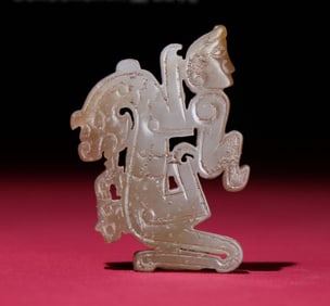 A Chinese Carved Jade Dragon Pendant