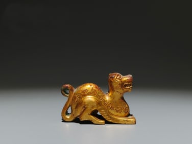A Chinese Gilt Bronze Tiger Statuette