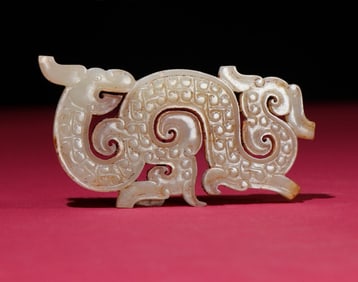 A Chinese Carved Jade Dragon Pendant