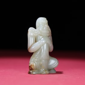 A Chinese Carved Jade Figure of Man