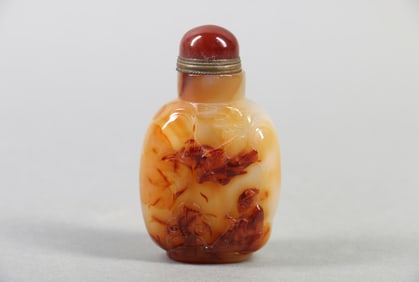 A Chinese Carved Agate Snuff Bottle