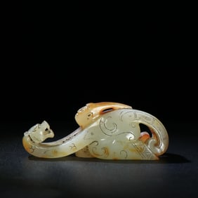 A Chinese Carved Jade Kneeling-Man Belt Buckle