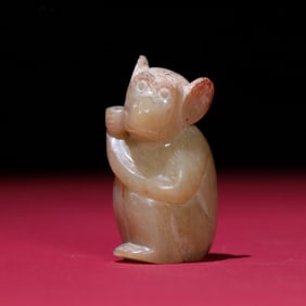 A Chinese Carved Jade Monkey Statuette