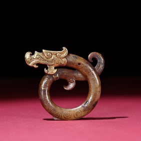 A Chinese Carved Jade Dragon Ring Pendant
