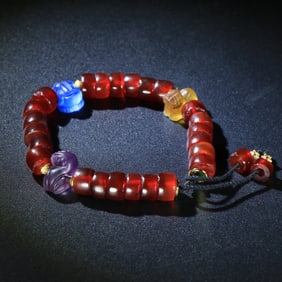 A Chinese Carved Agate Bracelet
