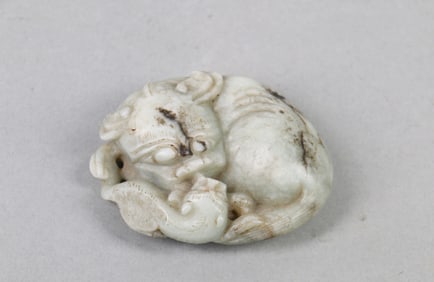 A Carved Jade Decoration of Two Foo Dogs