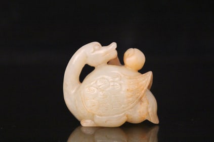 A Chinese Carved Jade Goose Statuette