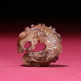A Chinese Carved Jade Dragon Pendant