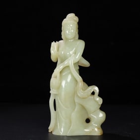 A Chinese Carved Jade Figure of Buddha