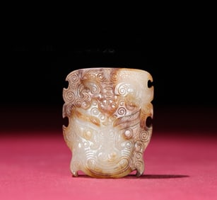 A Chinese Carved Jade Foo-Dog Pendant