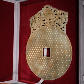 A Chinese Carved Jade Double Dragon Pendant
