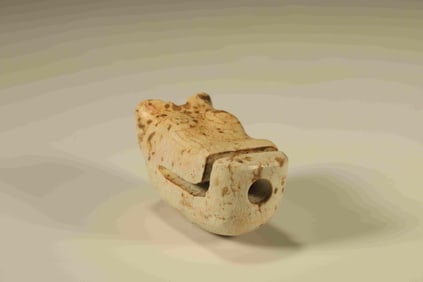 A Chinese Carved Jade Foo-Dog Pendant