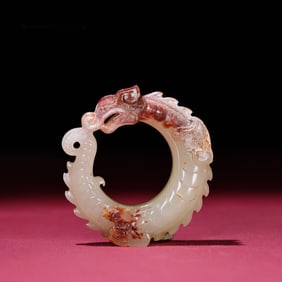 A Chinese Carved Jade Dragon Ring Pendant