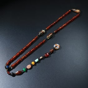 A Chinese Carved Agate Necklace
