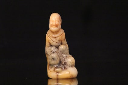 A Chinese Carved Stone Figure of Man