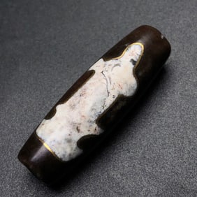 A Chinese Carved Agate DZI Bead