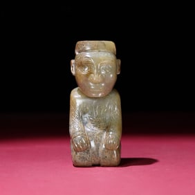 A Chinese Carved Jade Figure