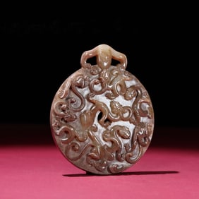 A Chinese Carved Jade Dragon Pendant