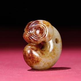 A Chinese Carved Jade Dragon Statuette