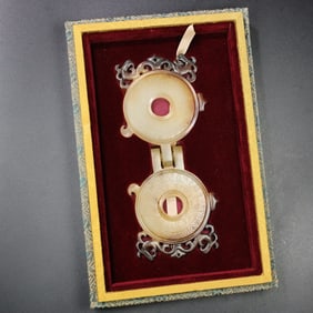 A Chinese Carved Jade Double-Ring Pendant