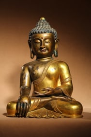 A Chinese Gilt Bronze Figure of Buddha