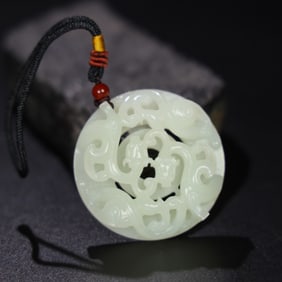 A Chinese Carved Jade Dragon Pendant
