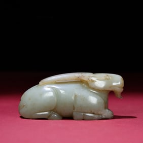 A Chinese Carved Jade Goat Statuette