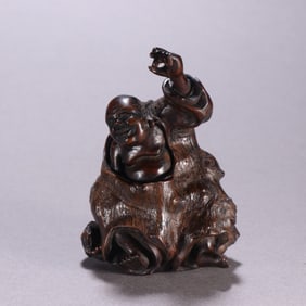A Chinese Carved Hardwood Figure of Buddha