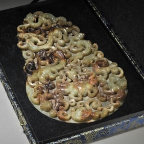 A Chinese Carved Jade Dragon Pendant