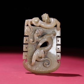 A Chinese Carved Jade Dragon on Axe Pendant