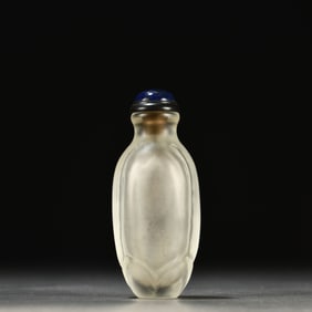 A Chinese Carved Peking Glass Snuff Bottle