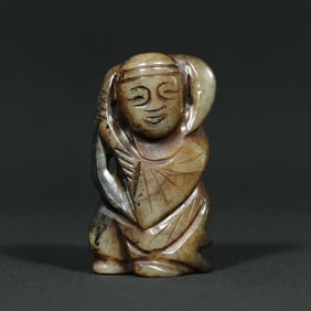 A Chinese Carved Jade Figure of Boy